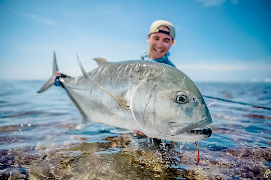 Super happy man caught giant trevally caught ion a flaming lamborghini fly with Alphonse Fishing Co™